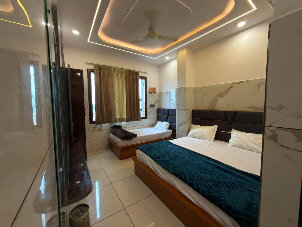Deluxe Triple Bed AC Room